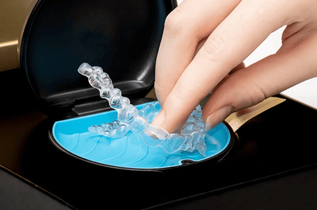 Invisalign clear aligners with storage case offer a more convenient option for cleaning teeth with braces and daily aligner care.